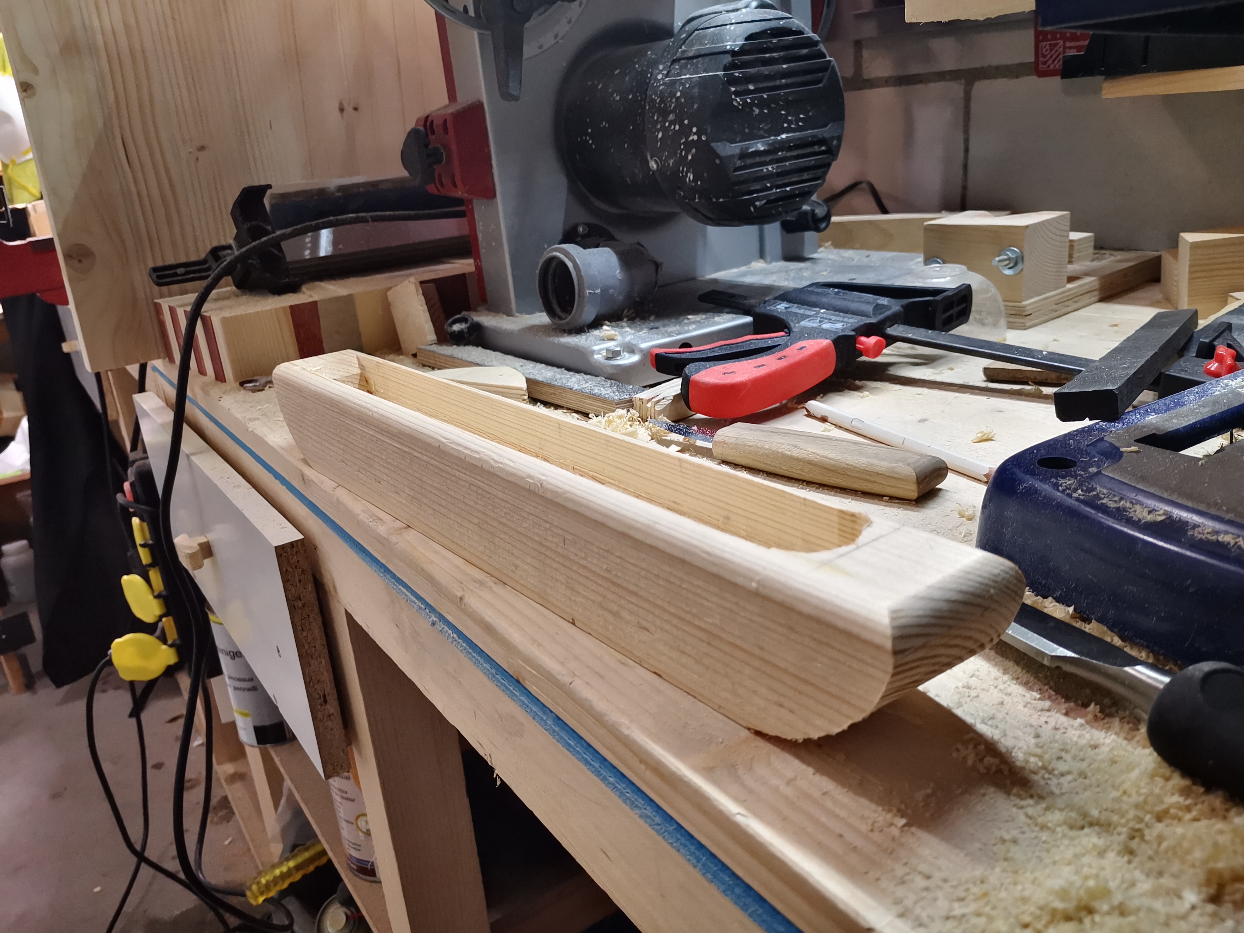 Hand tools and wood on the workbench